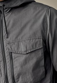 Next Jas - grey