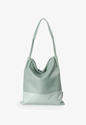 Borsa a mano in pelle verde menta con un design morbido e drappeggiato, caratterizzata da una parte superiore liscia e una sezione inferiore opaca a contrasto.