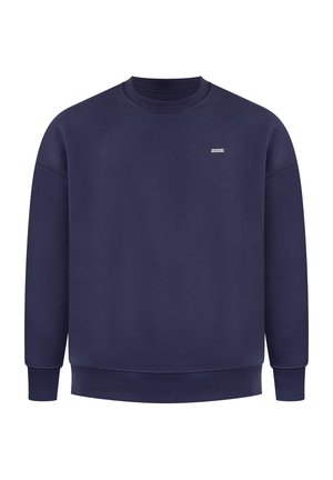 Navy blauwe sweatshirt gemaakt van zachte stof, met een ronde hals, lange mouwen, ribgebreide manchetten en een klein logo op de borst.
