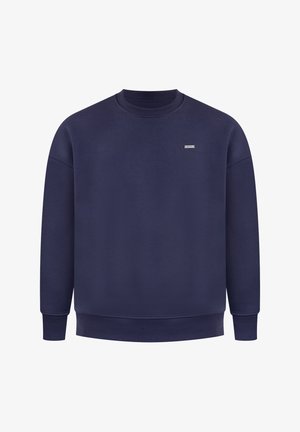 Navy blauwe sweatshirt gemaakt van zachte stof, met een ronde hals, lange mouwen, ribgebreide manchetten en een klein logo op de borst.
