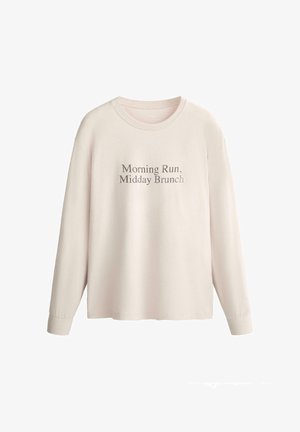 Világosbézs hosszú ujjú ing kerek nyakkal, a mellkason szürke színnel nyomtatott "Morning Run, Midday Brunch" felirattal.