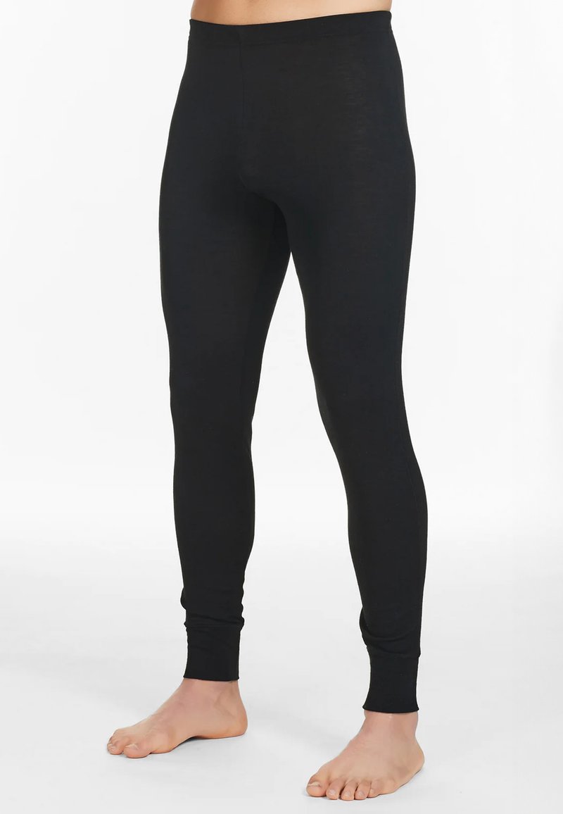 Leggings neri realizzati in un materiale morbido e elasticizzato. Design aderente con una texture liscia e polsini aderenti alla caviglia. Nessuna cucitura visibile.