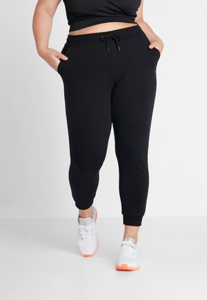 ONPELINA PANTS CURVY - Tracksuit bottoms - black