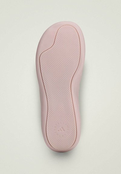 Pink rubber sole with textured surface and bordered design. Features a circular logo embossed at the heel. Smooth finish, contoured shape.
