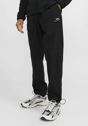 KLASSISCHE REGULAR FIT - Trousers - black