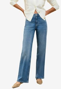 PETITE FIT - MID RISE - Široké nohavice - mid wash blue