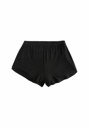 Svarta shorts av mjukt, elastiskt material. Har ett elastiskt midjeband och en lös passform med en något utställd form.