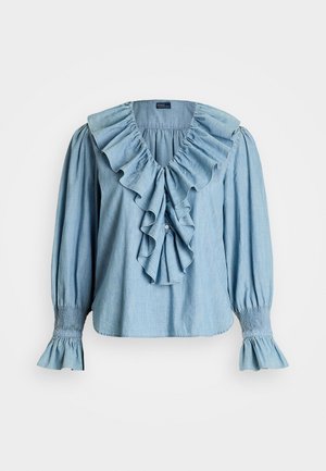 Himmelblaues Denim-Blusenshirt mit großem Rüschengesicht, Knopfdetails an der Vorderseite und elastischen Manschetten mit ausgestellt geschnittenen Ärmeln.
