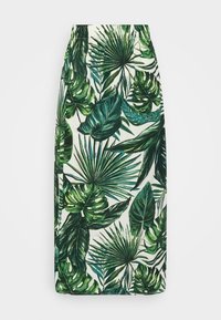 Jupe à motif de feuilles vertes avec une base blanche, présentant des nuances variées de feuillage vert dans un tissu lisse. Ceinture élastique pour le confort.