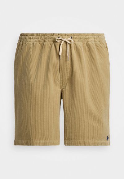 Κοντές παντελόνες από καπιτονέ ύφασμα σε καφέ χρώμα με ελαστική μέση, κλείσιμο με κορδόνι και διακριτική ραβδωτή υφή. Διαθέτουν ένα μικρό λογότυπο στο κάτω στρίφωμα.