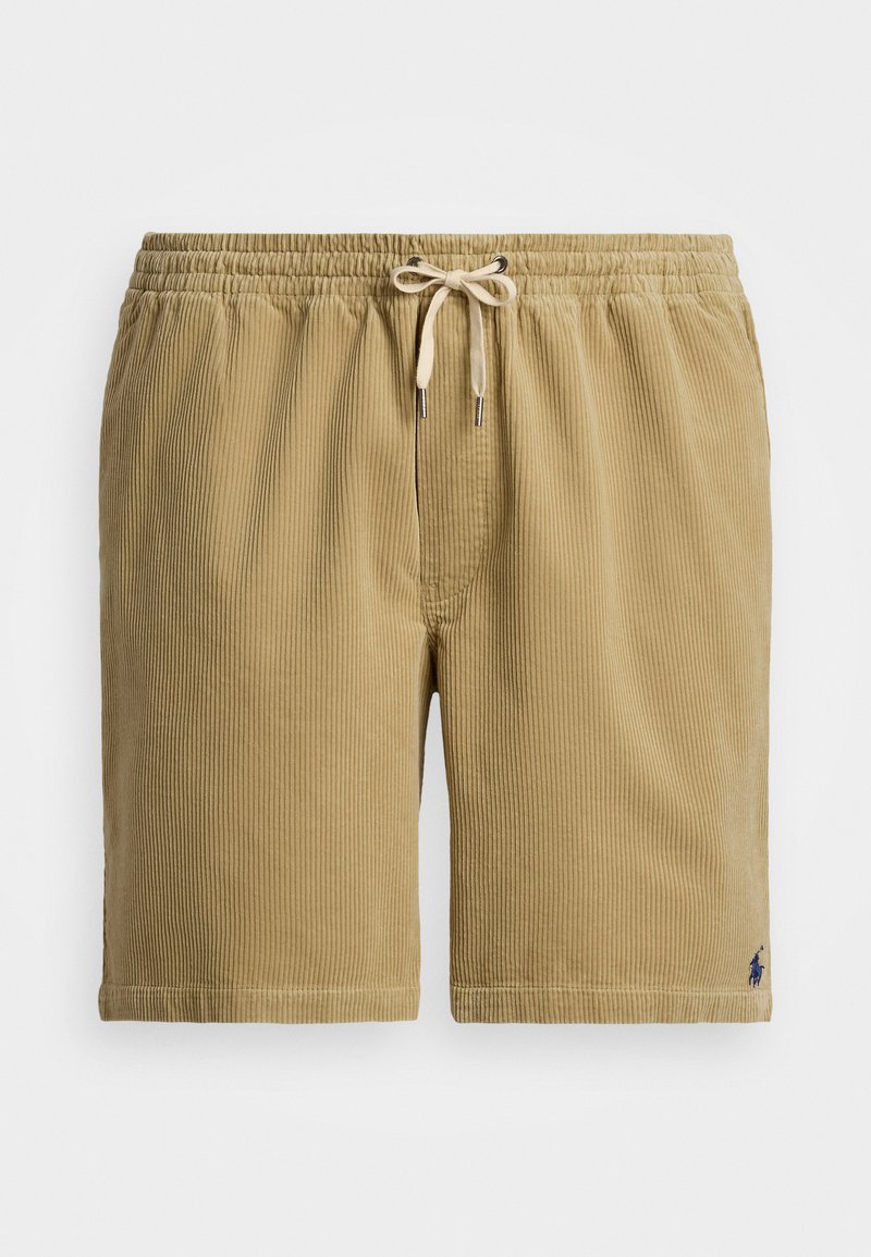 Bruna kordshorts med elastisk midja, dragsko och subtil ribbad textur. Har en liten logotyp på den nedre fållen.