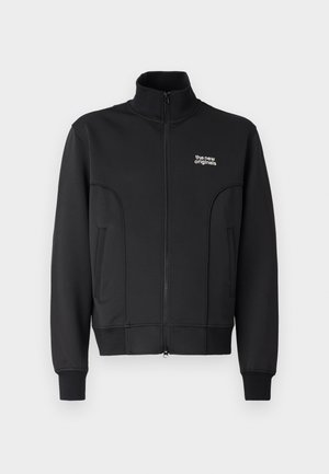 Black zip-up jacket made of smooth, stretchy fabric. Features high collar, side pockets, and a small white logo on the chest.