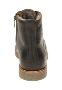 Bottine en cuir marron avec une finition texturée, doublure en fausse fourrure, fermeture éclair sur le côté et semelle robuste avec des accents marron et gris.