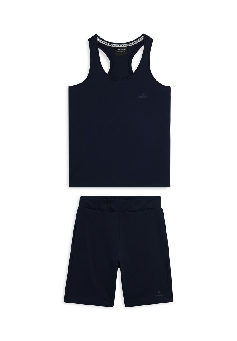 Set di top e pantaloni sportivi di colore blu navy, caratterizzato da un design con schiena a racer e una cintura elastica. Realizzato in tessuto leggero e morbido.