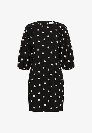 Robe noire avec des pois crème, manches courtes bouffantes, encolure ronde et une fermeture éclair dissimulée à l'arrière. Tissu doux avec une texture lisse.