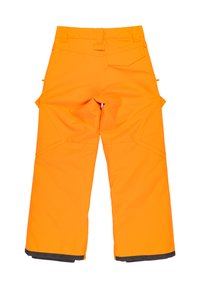 Oranžové nepremokavé lyžiarske nohavice so širokými nohavicami, nastaviteľným pásom a tmavosivými akcentmi na manžetách. Obsahujú bočné vrecká a zosilnené švy.