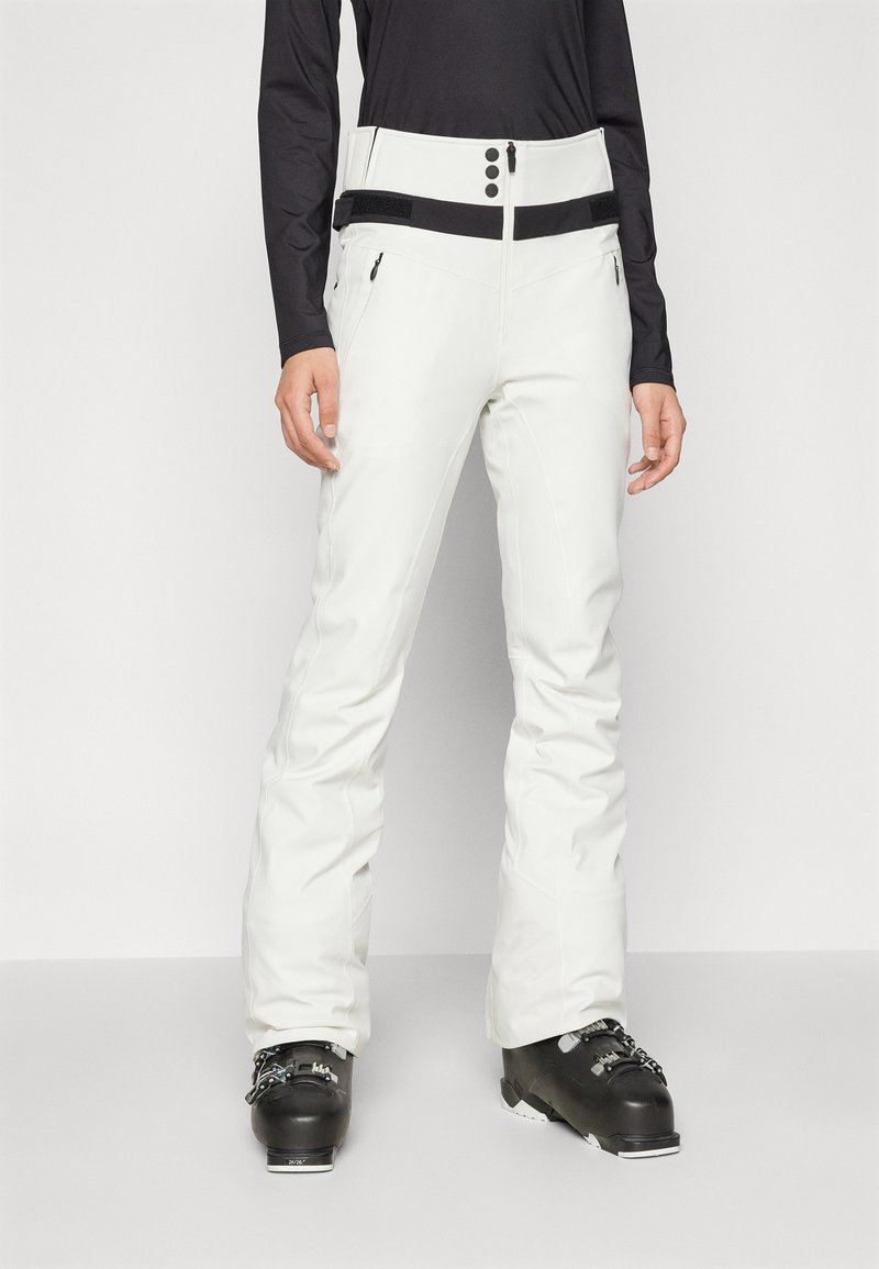 Witte skibroek met een gladde, waterdichte afwerking, met een hoge taille, zwarte accenten, knopen en ritszakken.