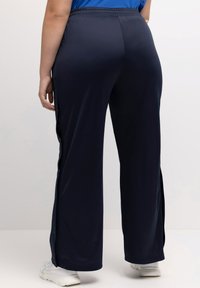 Ulla Popken Pantalones deportivos - black