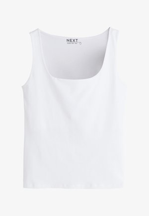 Bílá bezrukávová vesta se čtvercovým výstřihem, hladká tkanina a malá značková etiketa přišitá uvnitř vzadu.