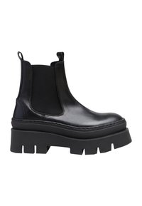 Bottines Chelsea en cuir noir avec panneaux élastiques sur les côtés, semelle en plateforme épaisse et coutures renforcées le long des coutures.