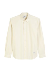 Lichtgele langarm knoopshirt met dunne verticale strepen, een puntige kraag en een klein logopatch aan de onderzijde.