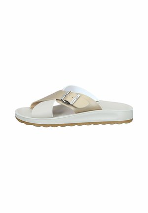 Beige and white slide sandal with crisscross straps, silver buckle, and textured tan sole, designed for casual wear.