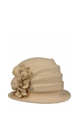 Beige cloche hat with layered fabric and decorative bow adorned with small golden beads on the side.
