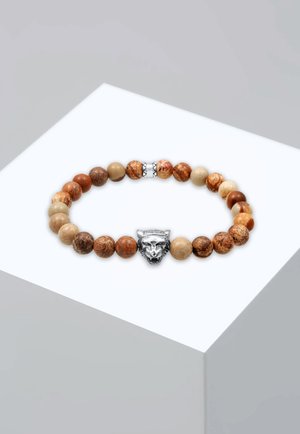 Bracelet en perles avec des sphères en pierres brunes et beiges, présentant un chef de panthère en argent comme pièce centrale et des accents métalliques décoratifs.