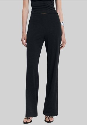 Spodnie materiałowe