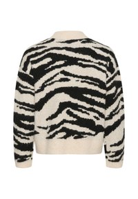 Kampsun musta ja kreemika zebra triibumustriga, pehme tekstuuriga, ümmarguse kaelusega ja pika varrukaga, pakkudes mugavat istuvust.