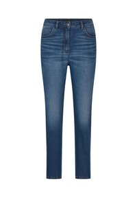 Jean skinny en denim bleu foncé, avec cinq poches, une fermeture éclair et un bouton. Fading subtil et détails de couture présents.