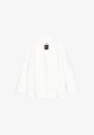 White faux fur jacket with long sleeves and open front, tag visible inside collar.