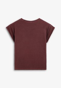 Camiseta de manga corta en color malva con cuello redondo y puños enrollados. Textura suave, corte relajado y diseño de la parte posterior sin adornos.