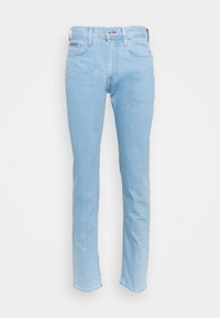 Jasnoniebieskie dżinsy z denimu o prostym kroju, wyposażone w pięć kieszeni, zapięcie na guziki oraz delikatne wyblaknięcia wzdłuż nogawek.