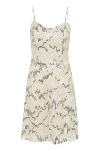 Lühike kleit kreemjas toonis, millel on tekstureeritud hõbedane sädelev muster. Omab reguleeritavaid spagetti õlgu ja istuvat varrukat ning avarduvat seelikut.