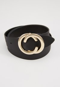 Black leather belt featuring a large, round gold buckle with interlocking design and a pointed end. Smooth texture, minimal hardware details.