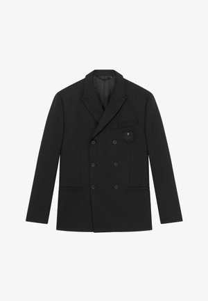 Schwarzer doppelt knöpfbarer Blazer aus strukturiertem Stoff, mit einem Reverskragen, zwei seitlichen Taschen und einem gestickten Emblem auf der Brust.