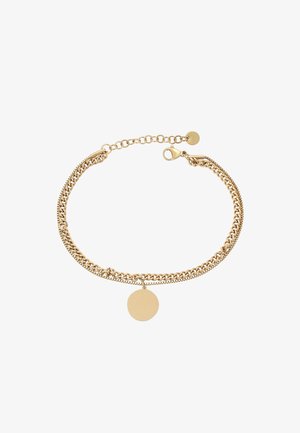 Gold-tone bracelet featuring layered chains and a circular charm pendant. Lobster clasp closure with adjustable chain links.