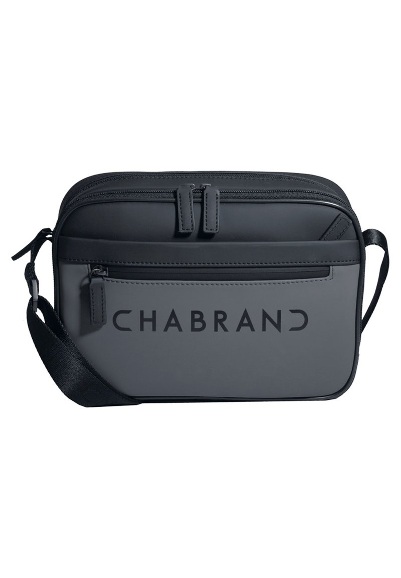 Borsa a tracolla nera compatta con un esterno liscio e opaco, dotata di due scomparti con cerniera e un logo ben visibile sul frontale.