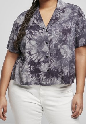 Short-sleeve, cropped shirt in a tie-dye pattern of gray and deep purple, featuring a button front and a soft, textured fabric.