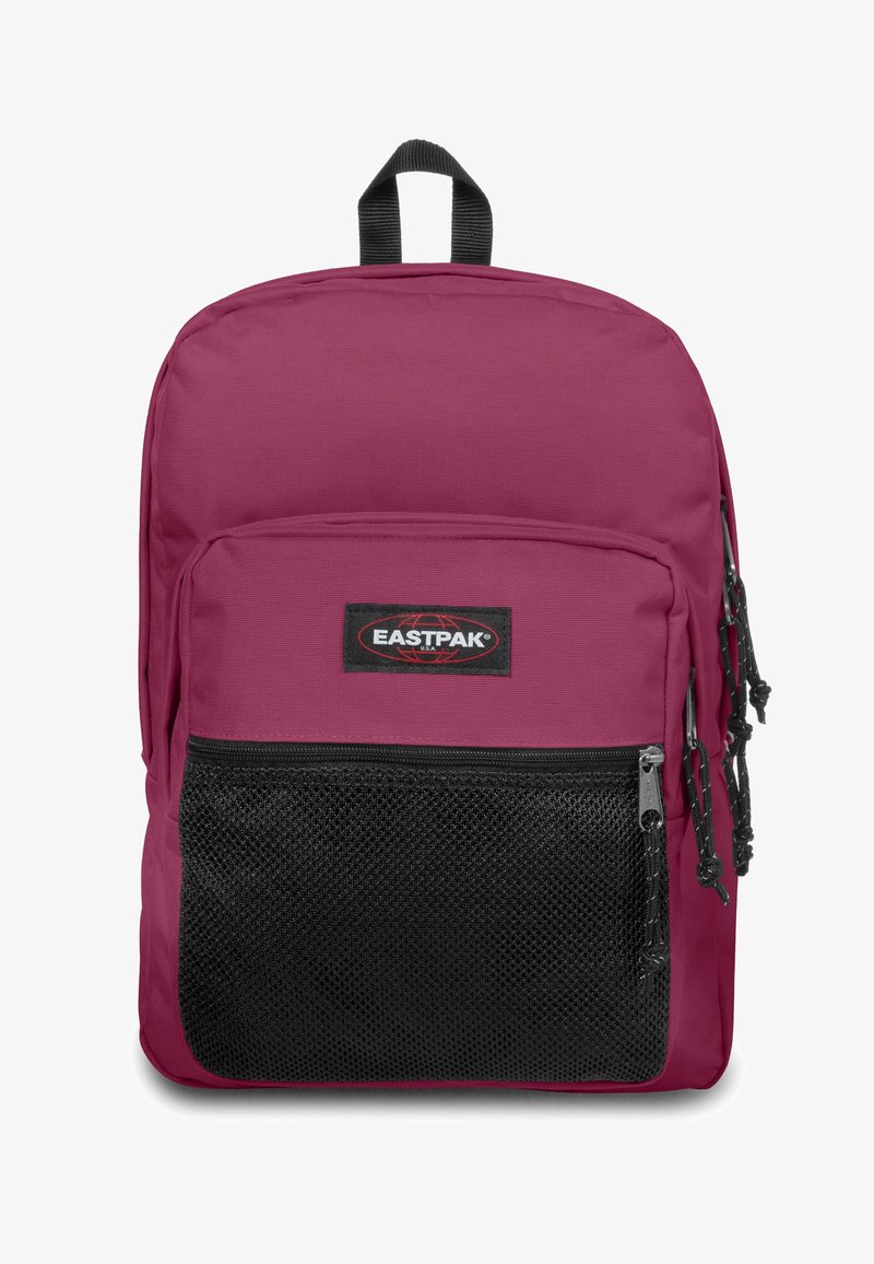 Maroon polyester ryggsäck med en svart mesh-frontficka, zippered stängning och ett handtag för bärande ovanpå. Har en Eastpak logotyp patch.