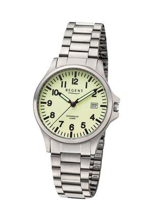 Analoge silberne Armbanduhr mit leuchtend gelbem Zifferblatt, schwarzen Zahlen, Datumsanzeige bei 3 Uhr und Metallgliederarmband, zeigt 10:10:38.