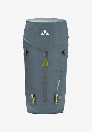 Zaino tecnico grigio con una forma slanciata, dotato di chiusura a coulisse, spallacci regolabili e dettagli in verde brillante.