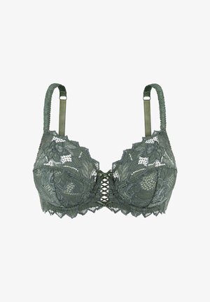 Soutien-gorge en dentelle olive avec des bords festonnés, des bretelles ajustables et un détail de laçage à l'avant, présentant des motifs géométriques et une superposition en mesh.