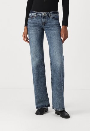 Faded blue denim jeans with a straight leg design, five pockets, and a button-fly closure. Stitched detailing on the seams.