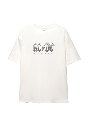 Hvid kortærmet t-shirt lavet af bomuld. Har et sort AC/DC logo og teksten "BACK IN BLACK" i en slidt stil på forsiden. Rund halsudskæring.