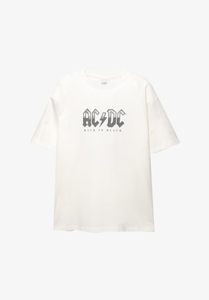Bela kratka majica s kratkimi rokavi iz bombaža. Na sprednji strani ima črn logotip AC/DC in besedilo "BACK IN BLACK" v obrabljenem slogu. Okrogla izreza.