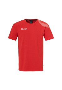 T-shirt rouge à manches courtes en coton, avec un col rond, un motif en mesh sur l'épaule et le logo "Kempa" en blanc.