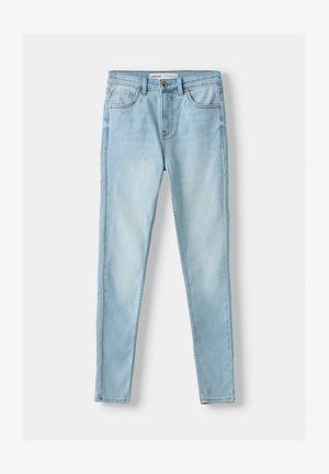 Light blue skinny jeans made of denim, featuring a five-pocket design with a button closure and faint whiskering for texture detail.