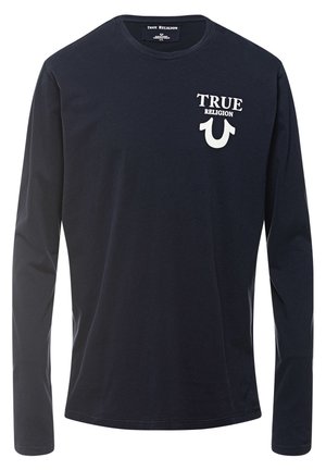 T-shirt noir à manches longues avec col rond et texte blanc "TRUE RELIGION" ainsi qu'un logo fer à cheval sur la poitrine gauche.